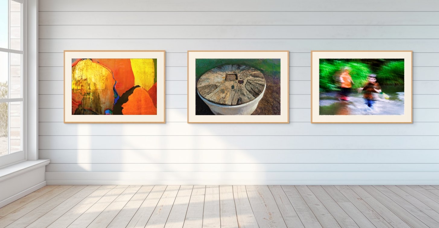 An image of multiple artworks on a museum wall
